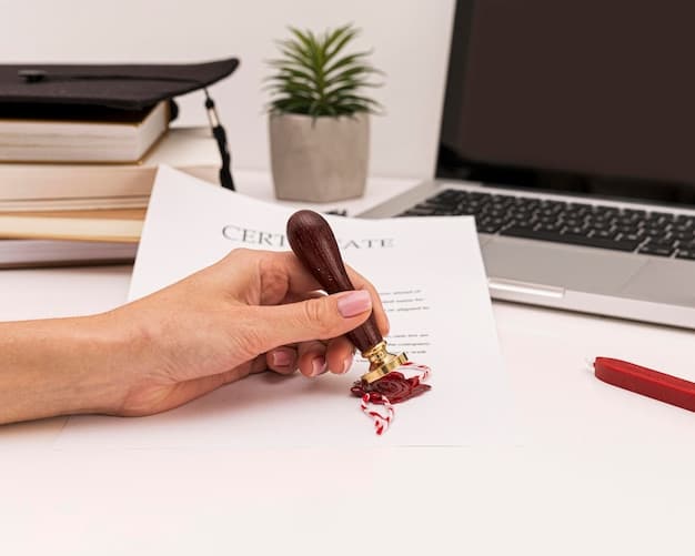 A close-up of a hand signing a student loan forgiveness application form with a pen. The form is neatly organized on a desk.