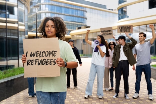 A diverse group of students protesting with signs advocating for student loan forgiveness outside a government building.