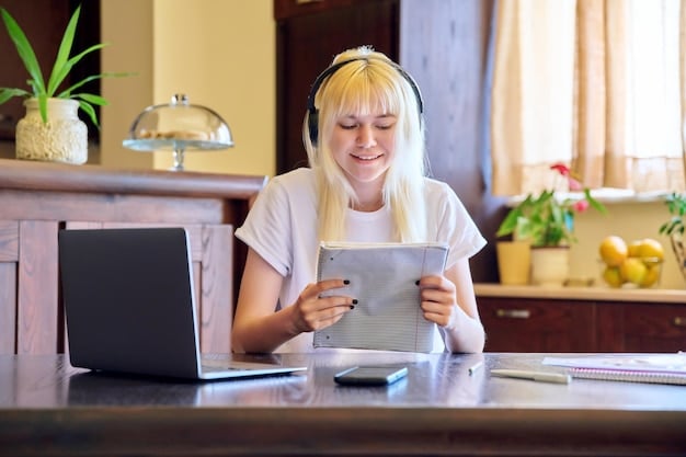 A smiling college student sitting at a desk with a calculator and tax forms, focused on completing paperwork, highlighting the process of claiming tax credits for education.