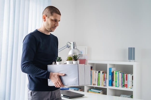 A person organizing and filing important financial documents in a well-lit home office.