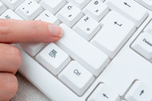 Close-up of a laptop screen displaying the FAFSA website, with a cursor hovering over the 
