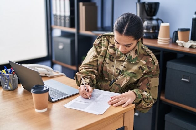 A focused military dependent filling out a scholarship application form at a desk with books and a laptop, highlighting determination and resourcefulness in pursuing education.