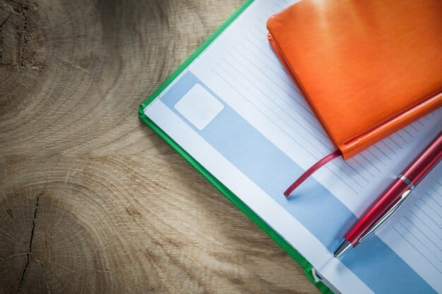 A close-up shot of scholarship application forms and a pen on a wooden desk, symbolizing the effort required to secure funding.