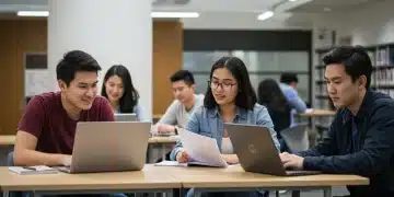 Students studying together in a modern university library